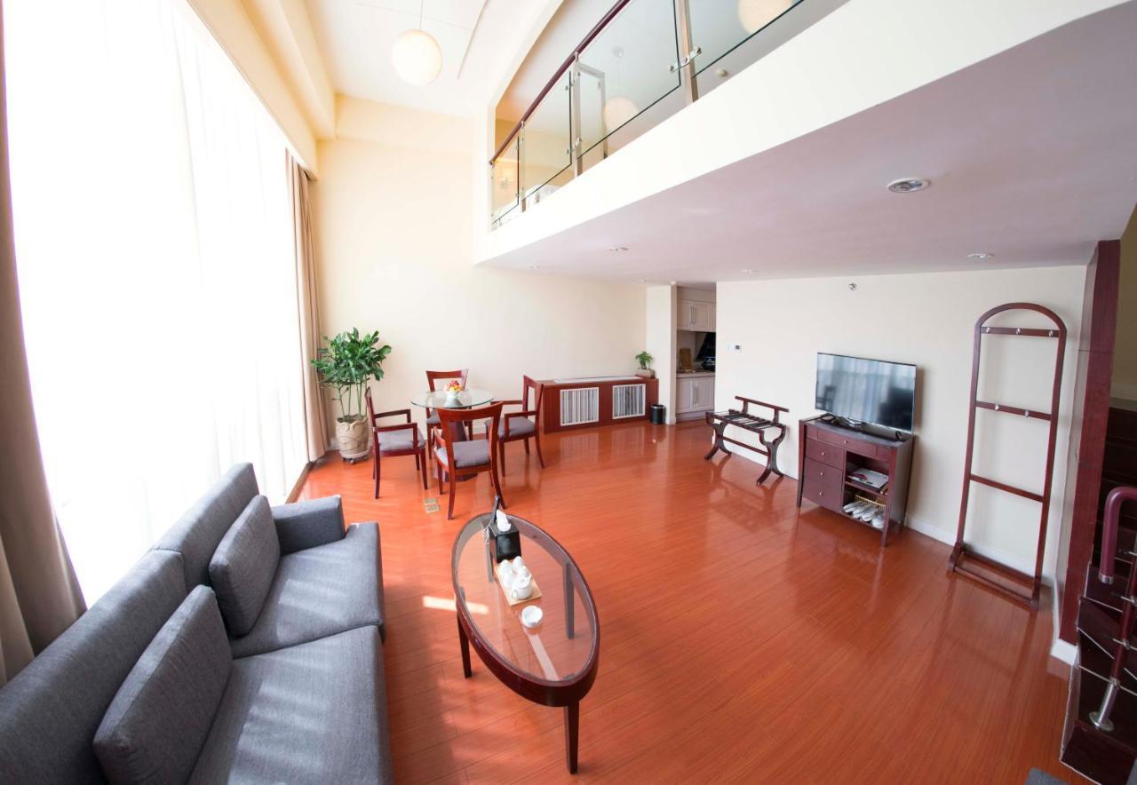 Yantai Meiya International Aparthotel Buitenkant foto