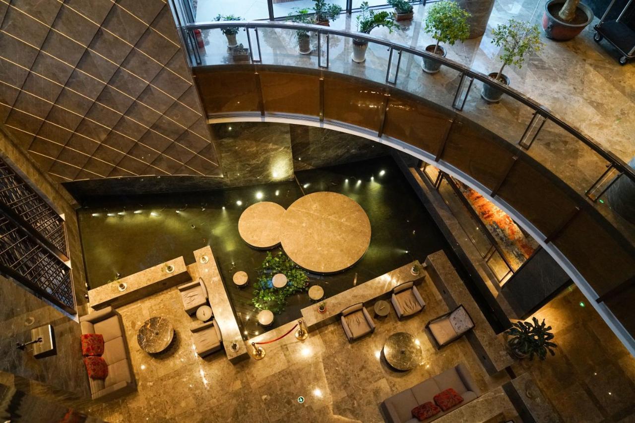 Yantai Meiya International Aparthotel Buitenkant foto